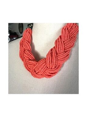 Coral-hued Chunky Braid Seed Bead Necklace.